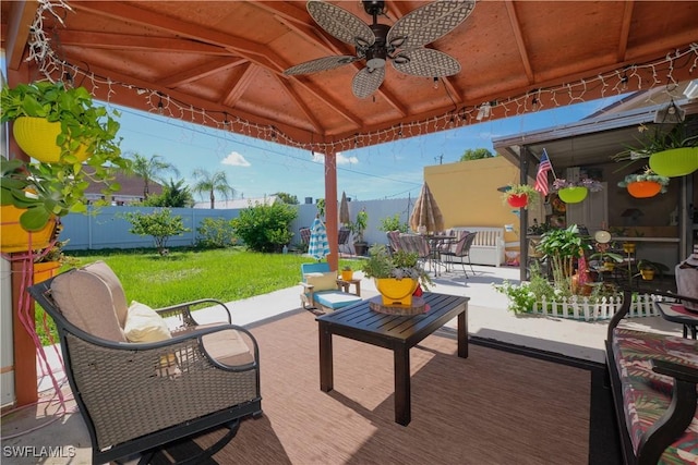 view of patio / terrace featuring ceiling fan