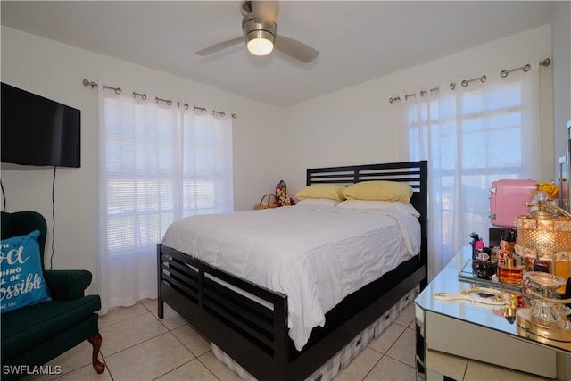 bedroom featuring ceiling fan and light tile patterned floors