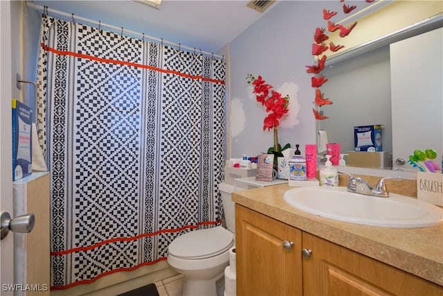 bathroom featuring tile patterned flooring, vanity, toilet, and a shower with curtain