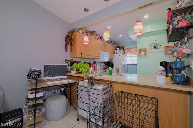 kitchen with kitchen peninsula, white appliances, decorative light fixtures, and light tile patterned flooring