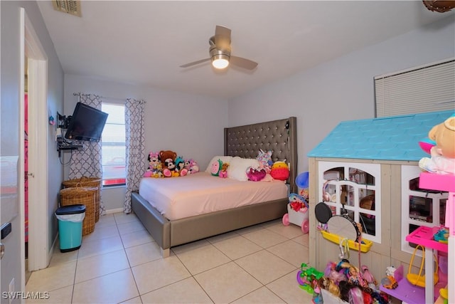 bedroom with light tile patterned floors and ceiling fan