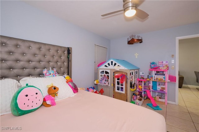 tiled bedroom with ceiling fan