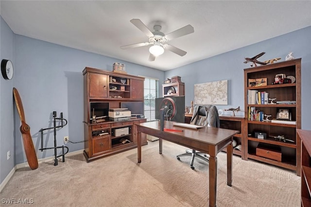 office with ceiling fan and light colored carpet