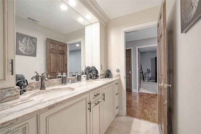 bathroom featuring vanity and tile patterned flooring