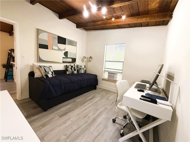 office with beam ceiling, wooden ceiling, and light wood-type flooring