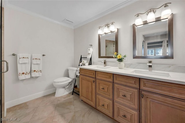 bathroom with vanity, toilet, a shower with shower door, and crown molding