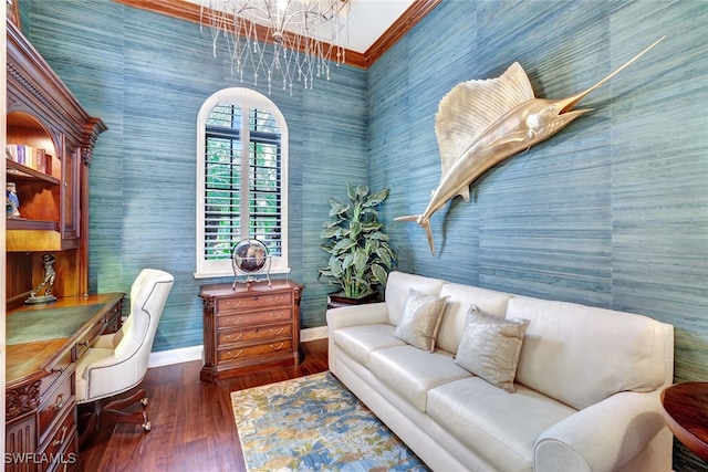 home office with an inviting chandelier, dark hardwood / wood-style flooring, and built in desk