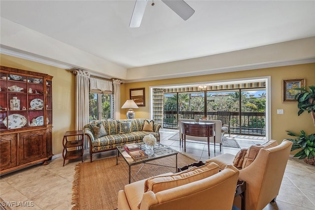 living room featuring ceiling fan and light tile patterned floors