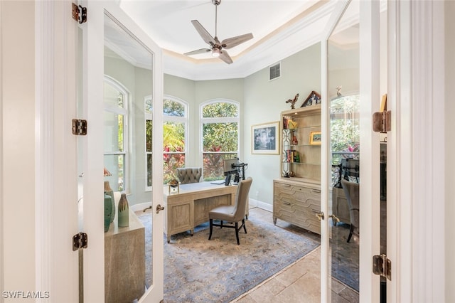 tiled home office with ceiling fan, crown molding, and french doors