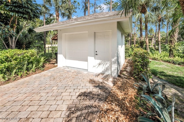 exterior space with a garage