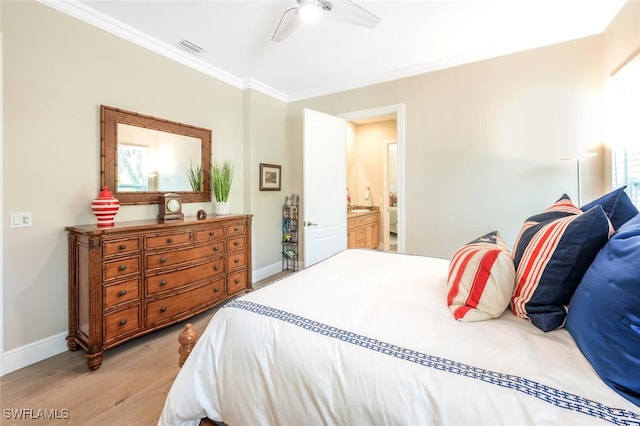 bedroom featuring ornamental molding, ensuite bathroom, ceiling fan, and light hardwood / wood-style floors