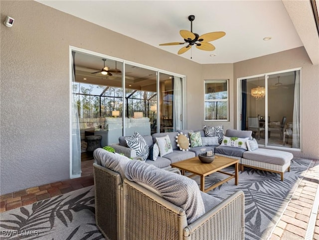 view of patio / terrace with ceiling fan and an outdoor hangout area