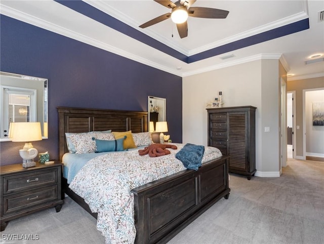 bedroom with ceiling fan, light carpet, and crown molding