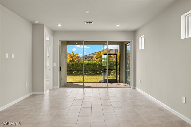 view of tiled spare room