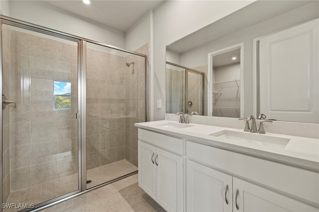 bathroom featuring vanity and walk in shower