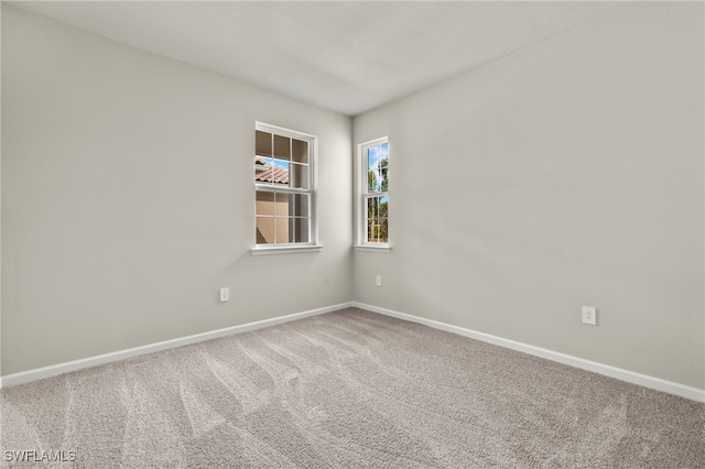 view of carpeted spare room