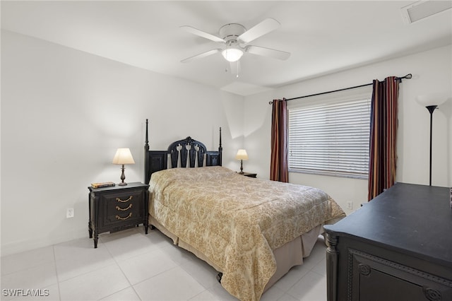 bedroom featuring ceiling fan and light tile patterned flooring