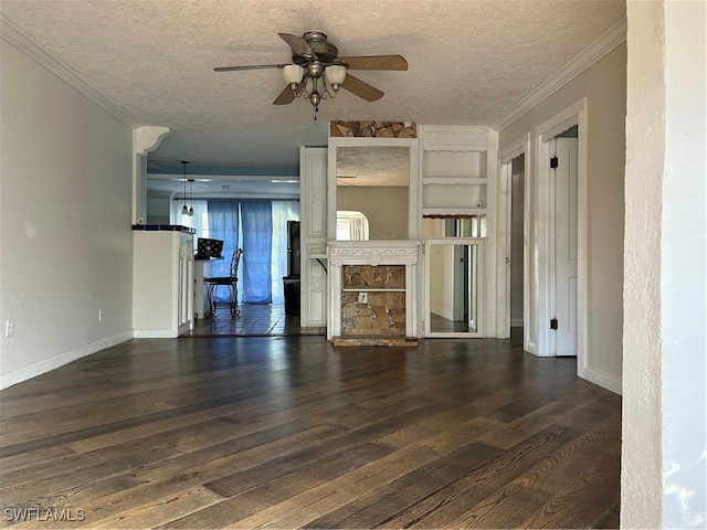 unfurnished living room with a textured ceiling, ceiling fan, dark hardwood / wood-style flooring, and ornamental molding