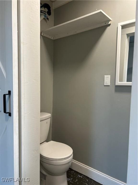 bathroom featuring toilet