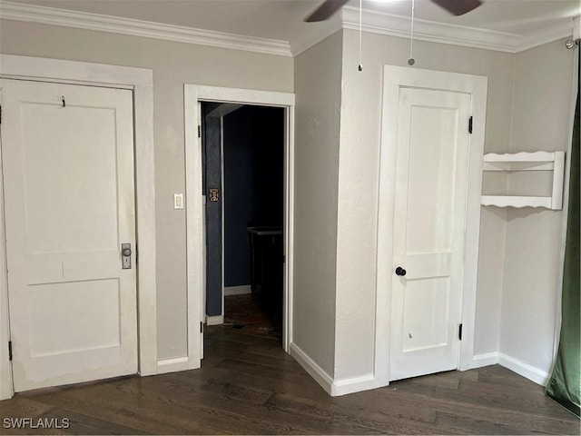 corridor with crown molding and dark hardwood / wood-style floors