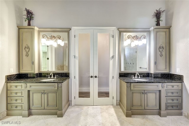 bathroom with vanity and tile patterned flooring