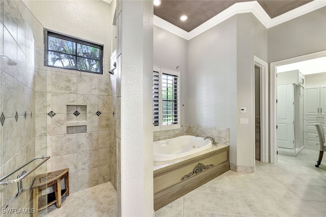 bathroom with tile patterned floors, ornamental molding, independent shower and bath, and a wealth of natural light