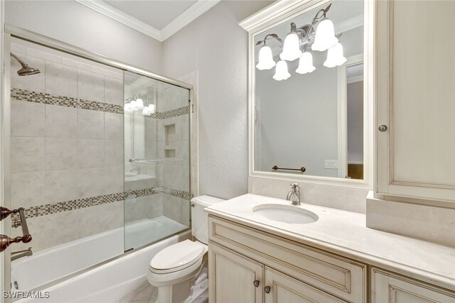 full bathroom with vanity, crown molding, shower / bath combination with glass door, and toilet