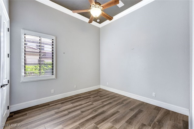 spare room with hardwood / wood-style flooring and ceiling fan