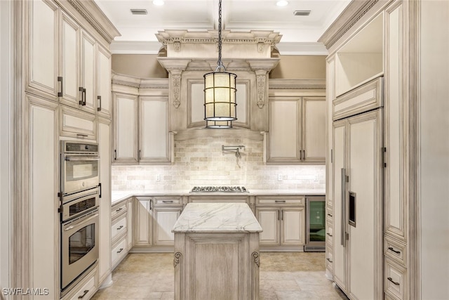 kitchen with appliances with stainless steel finishes, pendant lighting, wine cooler, decorative backsplash, and a center island