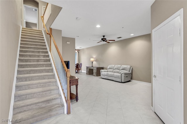 living room with ceiling fan