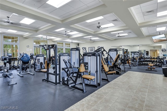 workout area with ornamental molding, ceiling fan, and a wealth of natural light