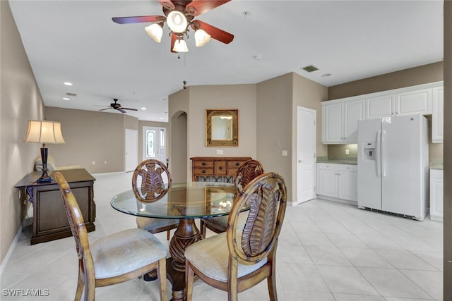 dining room featuring ceiling fan