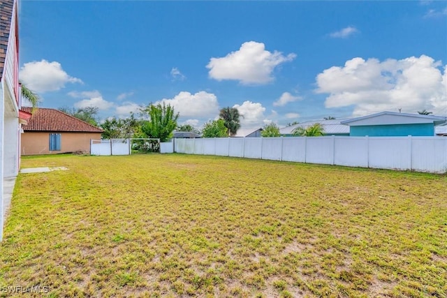 view of yard with fence