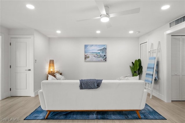 living room with ceiling fan