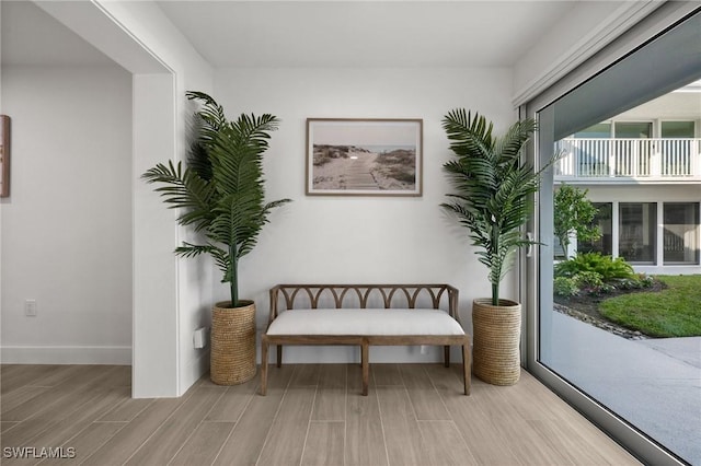 342 Harbour Dr, Naples, FL 34103 - sitting room with baseboards and wood tiled floor