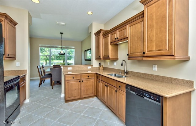 kitchen featuring kitchen peninsula, decorative light fixtures, black appliances, light tile patterned flooring, and sink