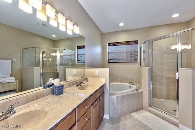 bathroom with separate shower and tub, tile patterned flooring, and vanity