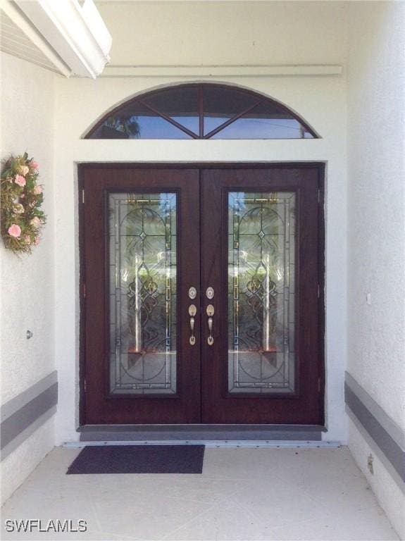 property entrance with french doors