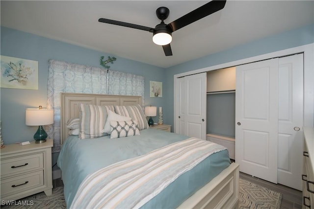 bedroom with ceiling fan and light hardwood / wood-style floors