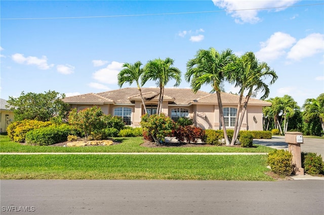 view of front of property with a front yard