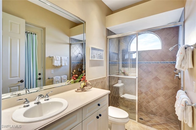4200 Sanctuary Way, Bonita Springs, FL 34134 - full bathroom with vanity, a shower stall, tile walls, and tile patterned flooring