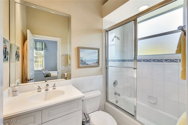 4200 Sanctuary Way, Bonita Springs, FL 34134 - bathroom with ensuite bathroom, shower / bath combination with glass door, and vanity