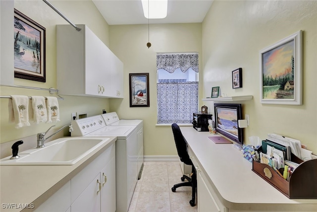 washroom with washer and dryer, cabinets, sink, and light tile patterned floors