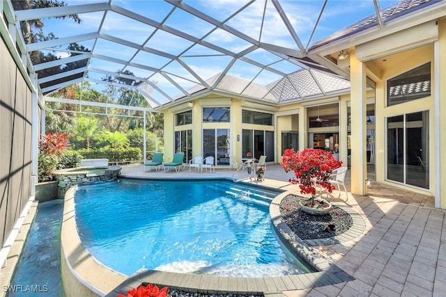 4200 Sanctuary Way, Bonita Springs, FL 34134 - view of pool with a patio, a pool with connected hot tub, a ceiling fan, and a lanai