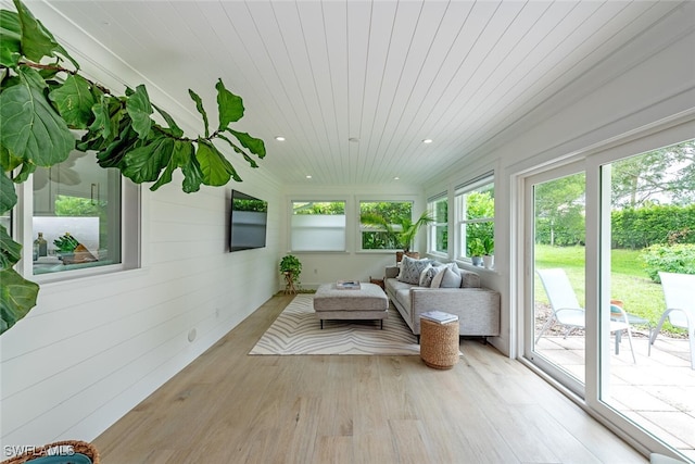 sunroom featuring wooden ceiling