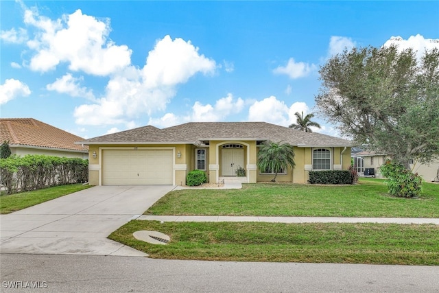 single story home featuring a front yard and a garage