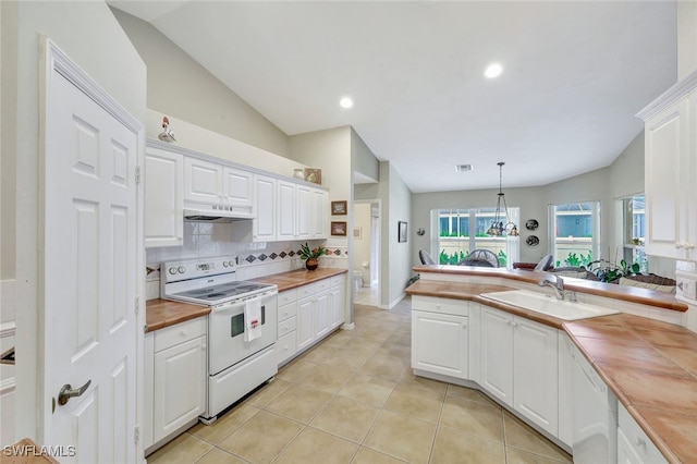 kitchen featuring decorative light fixtures, butcher block countertops, white electric range oven, and white cabinets