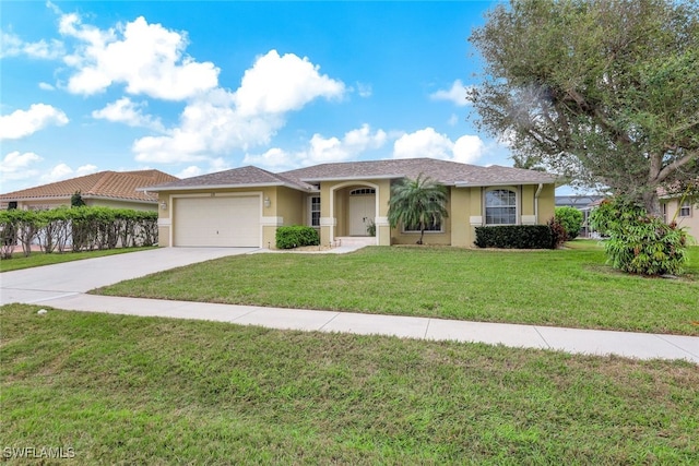 view of front of home featuring a garage and a front yard