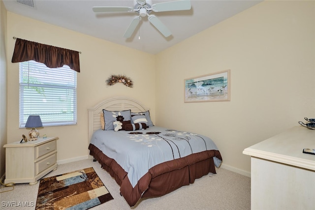 bedroom featuring ceiling fan and light colored carpet