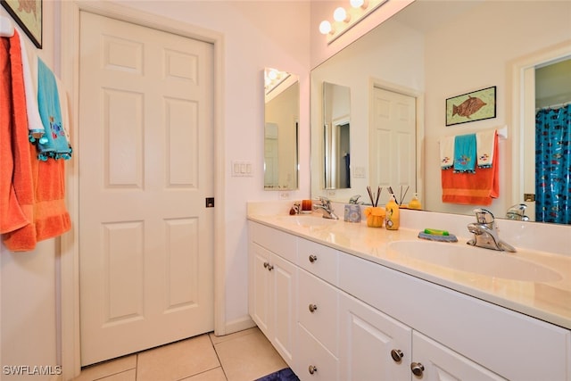 bathroom featuring vanity and tile patterned floors